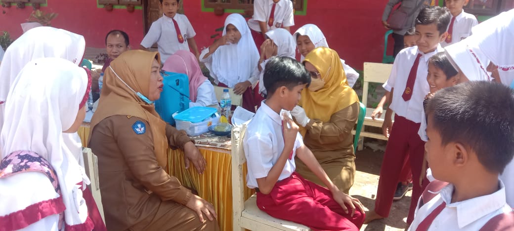 Pelaksanaan Vaksinasi Covid-19 untuk anak usia 6 s.d 11 Tahun di SD Negeri 02 Inderapura Tengah